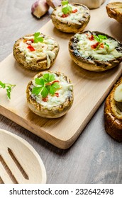Grilled Mushrooms Stuffed With Blue Cheese And Chilli And Garlic Toast