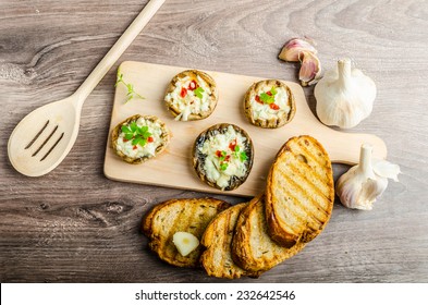 Grilled Mushrooms Stuffed With Blue Cheese And Chilli And Garlic Toast