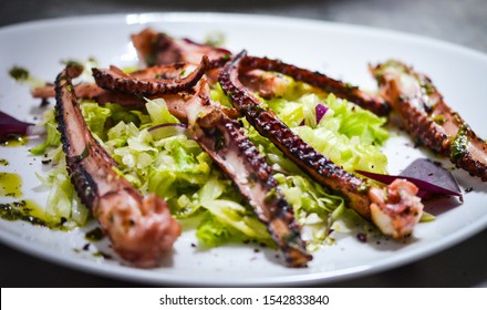 Grilled Octopus Fresh Lemon Juice Lettuce Stock Photo 1542833840 ...