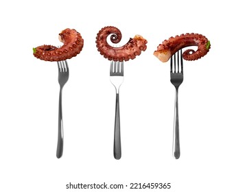 Grilled octopus tentacle on forks isolated. Delicious barbecue seafood on fork, grilled octopus dish with fresh greens on white background
