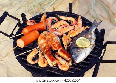 Grilled On The Beach. Grilled Seafood, Fish, Sea Bream, Salmon Steak, Large Shrimp, Fried Toast Bread
