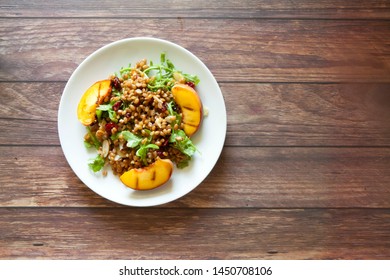 Grilled Peaches And Almond Wheatberry Salad With Arugula