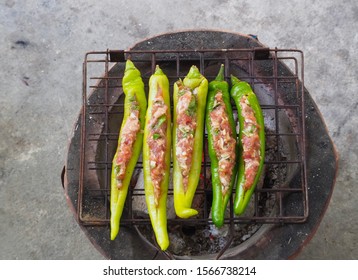 Grilled Peppers Stuffed Pork Chops On The Stove. Thai Food