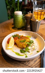 Grilled Pike Perch On A White Plate In A Restaurant