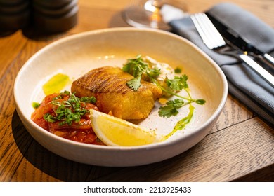 Grilled Pike Perch On A White Plate In A Restaurant