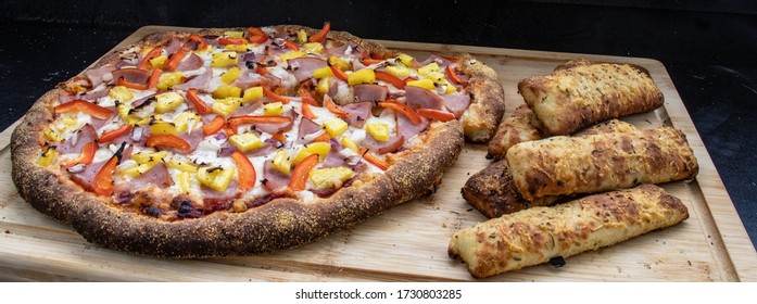 Grilled Pineapple Pizza With Bread Sticks. 