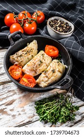 Grilled Pollock Or Coalfish Fillets In A Pan. White Background. Top View