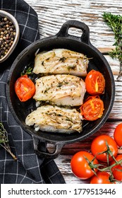 Grilled Pollock Or Coalfish Fillets In A Pan. White Background. Top View