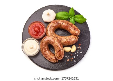 Grilled pork bangers, isolated on white background.