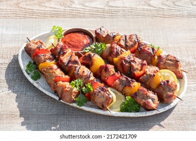 Grilled pork kebab with red and yellow pepper