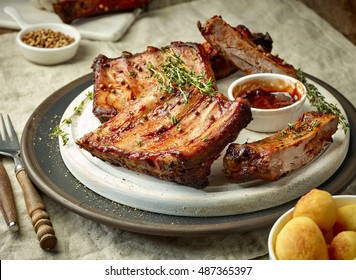 Grilled Pork Ribs On Dark Plate