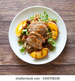 Grilled Pork Tenderloin And  Peaches With Almond Wheatberry Salad