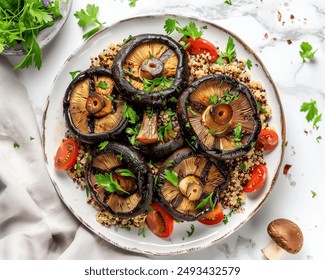 Grilled Portobello Mushrooms, Marinated portobello mushrooms grilled to perfection, served with a side of quinoa salad. - Powered by Shutterstock