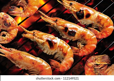 Grilled Prawns On Flaming Grill.