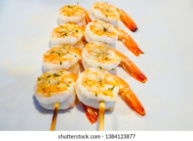 Grilled prawns skewer with hot and spicy ingredient eat with hot and spicy sauce, delicious seafood.Appetizer meal - Shutterstock ID 1384123877