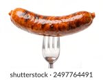 Grilled precook smoke beef sausage on a fork isolated on white background, clipping path