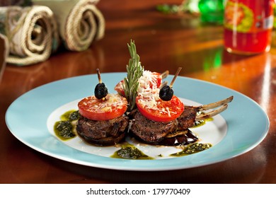 Grilled Rack Of Lamb With Tomatoes And Pesto