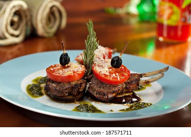 Grilled Rack Of Lamb With Tomatoes And Pesto