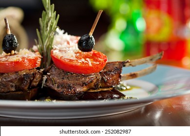 Grilled Rack Of Lamb With Tomatoes And Pesto