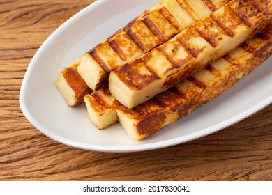 Grilled Rennet Or Coalho Cheese On A White Plate.