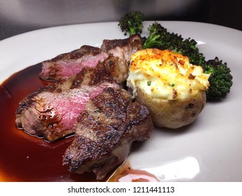 Grilled Ribeye Steak With Charred Broccolini And Twice Baked Potato