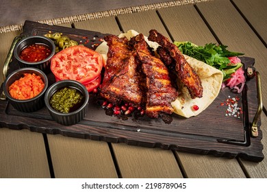 Grilled Ribs With Flatbread And Sauces