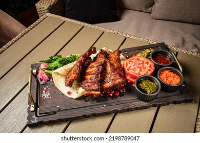 Grilled Ribs With Flatbread And Sauces