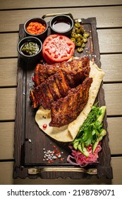 Grilled Ribs With Flatbread And Sauces