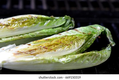 Grilled Romaine Lettuce Halves On The Barbecue.