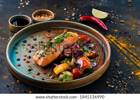 Grilled Salmon with cooked Vegetables, Keto friendly salmon with vegetables diet dish. Paleo, keto, fodmap, dash diet. Healthy concept, gluten free, lectine free