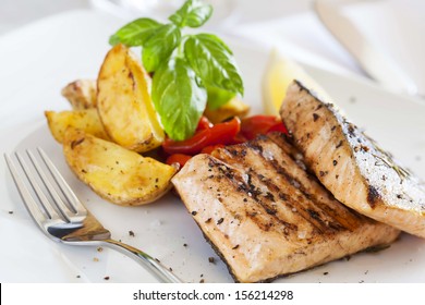 Grilled Salmon Filet With Baked Potatoes