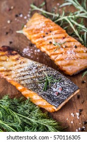 Grilled Salmon Fillets With Salt Pepper And Herb Decoration.