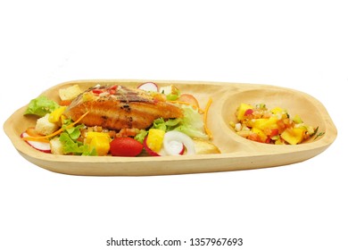 Grilled Salmon And Mango Salsa Salad In A Wooden Plate Isolated On White Background