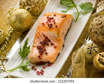 Grilled Salmon With Pink Pepper On Christmas Table