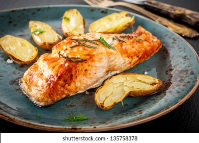 Grilled Salmon And Roasted Potatoes With Herbs