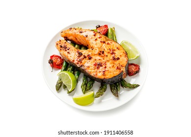 Grilled Salmon Steak With Asparagus And Tomatoes Cherry On A White  Plate Isolated On White  Background 