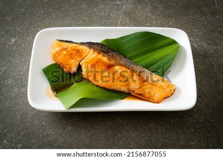 Grilled Salmon Steak with Soy Sauce on plate - Japanese food style