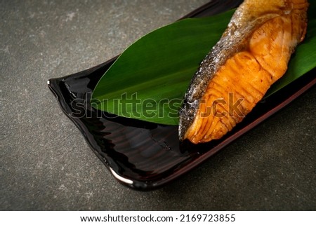 Grilled Salmon Steak with Soy Sauce on plate - Japanese food style
