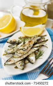 Grilled Sardine Fish Served With Rosemary And Lemon