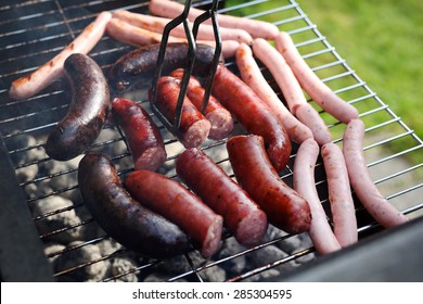 Grilled Sausages On The Grill. Sausage, Blood Sausage Roasted On The Grill Garden Barbecue