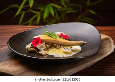 Grilled Sea Bass Fillet With Ginger Sauce And Clams  Fusion Food 