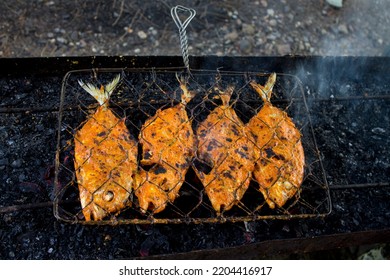 Grilled Sea Fish On A Grill, Prepared For The Favorite Menu At The Restaurant