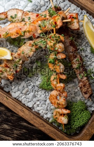 Similar – Image, Stock Photo Skewering moss on a wall stone in front of a blurred background