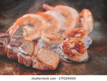 Grilled Seafood  In Teppanyaki Style Set In Iron Plate.