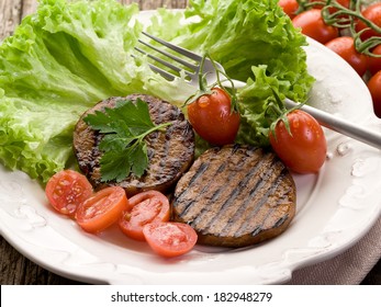 Grilled Seitan With Tomatoes And Salad