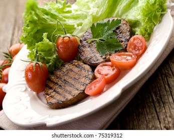 Grilled Seitan With Tomatoes And Salad