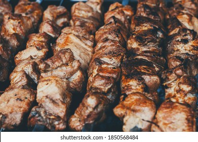 Grilled Shish Kebab Close Up. Food Festival In The City. Roasting Delicious Food On A Spit, Food Court. Summer Picnic