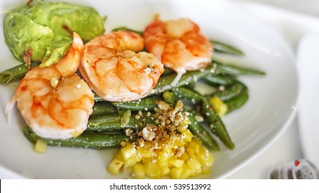 Grilled Shrimp Entree With Roasted String Green Beans And Avocado Corn Salsa