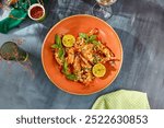 Grilled Shrimp with Lime on Rustic Plate - Top View - Gourmet Seafood Dish.