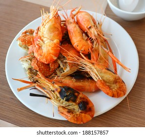 Grilled Shrimp On A Plate At The Table